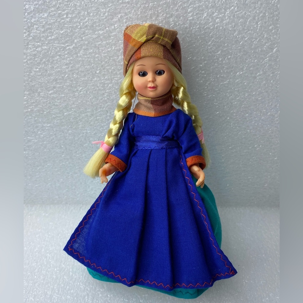 Vintage 7.5 inch Souvenir Plastic Blonde Hair Doll With Blue Sleepy Eyes